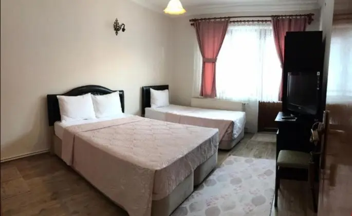 Üç Kişilik Balkonlu Oda