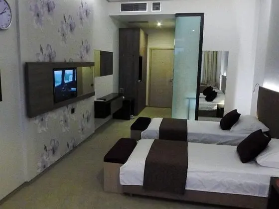Deluxe Tek Büyük veya İki Ayrı Yataklı Oda