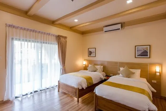 1 Çift Kişilik Veya 2 Tek Kişilik Yatak Deluxe Garden View
