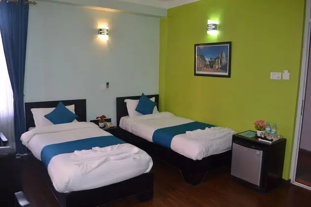 Deluxe Tek Büyük veya İki Ayrı Yataklı Oda