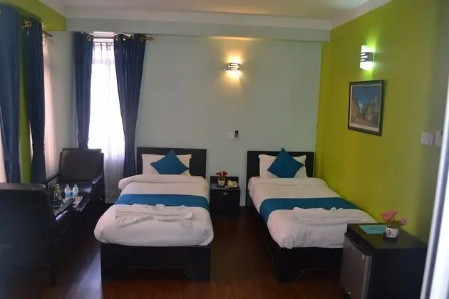 Deluxe Tek Büyük veya İki Ayrı Yataklı Oda
