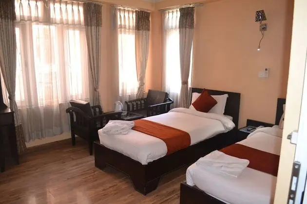 Deluxe Tek Büyük veya İki Ayrı Yataklı Oda
