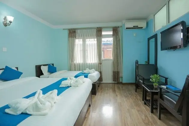 Deluxe Tek Büyük veya İki Ayrı Yataklı Oda