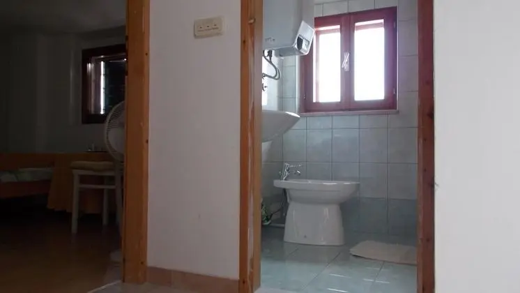 Standard Üç Kişilik Oda, Ortak Banyo
