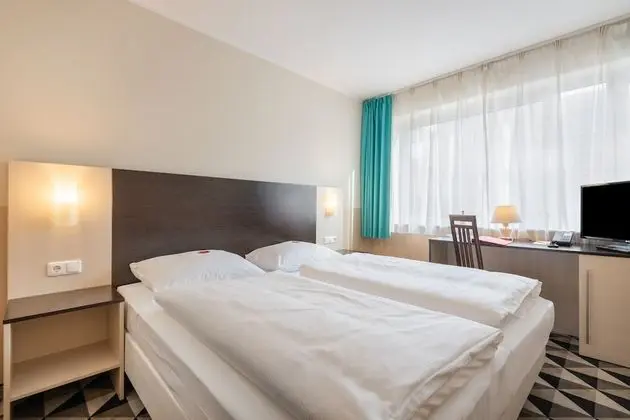 Comfort Tek Büyük veya İki Ayrı Yataklı Oda