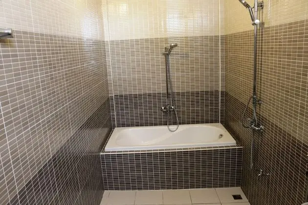 Deluxe Tek Büyük Yataklı Oda, Küvet