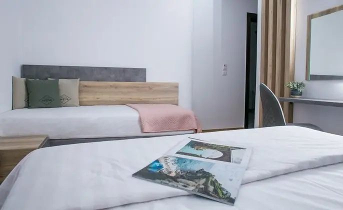 Deluxe Üç Kişilik Oda