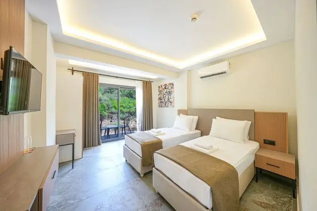 https://images.etstur.com/imgproxy/resize/2560x1440/files/images/hotelImages/etsrooms/514987/Ada_Butik_Otel_Marmaris_20240615170026_4.jpg