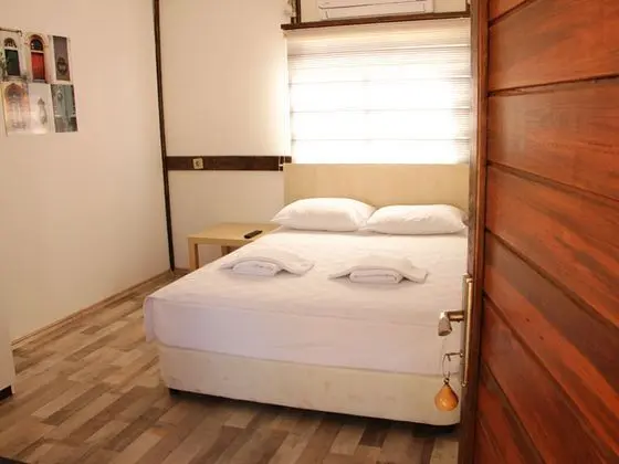 Bungalow 3 Kişilik Oda, Deniz veya Bahçe Manzaralı