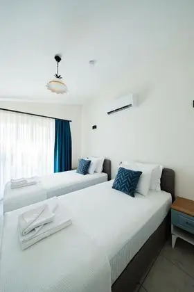 https://images.odamax.com/img/1920x1080/odamax/image/upload/Ada_Yeli_Karaburun_202607201545099_Adayeli_Hotel_0383.jpg