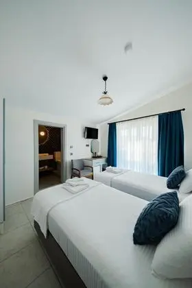 https://images.odamax.com/img/1920x1080/odamax/image/upload/Ada_Yeli_Karaburun_202607202007414_Adayeli_Hotel_0387.jpg