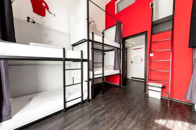 Bed in 10-Bed Dormitory Room with Private Bathroom