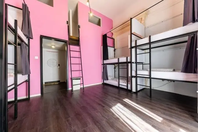 Bed in 10-Bed Dormitory Room with Private Bathroom