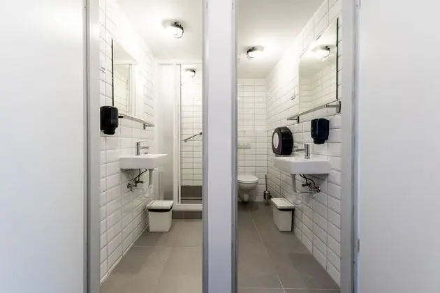 Bed in 10-Bed Dormitory Room with Private Bathroom