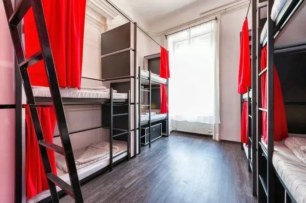 Bed in 10-Bed Dormitory Room with Private Bathroom