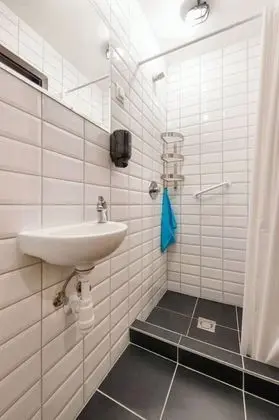 Bed in 10-Bed Dormitory Room with Private Bathroom