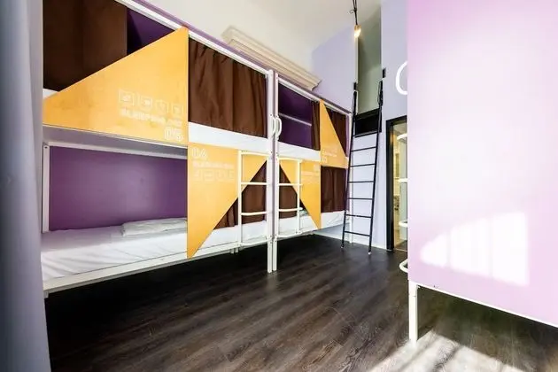 Bed in 8-Bed Dormitory Room with Private Bathroom