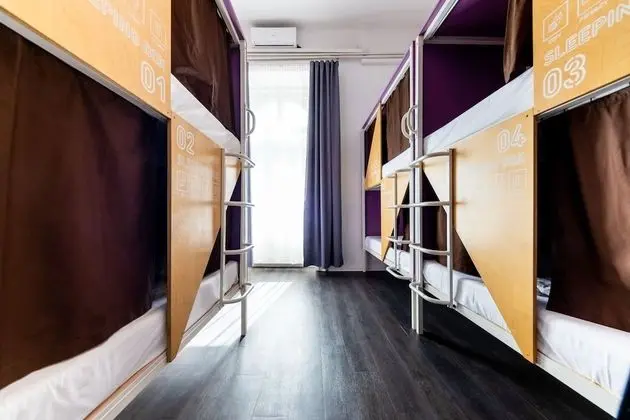 Bed in 8-Bed Dormitory Room with Private Bathroom