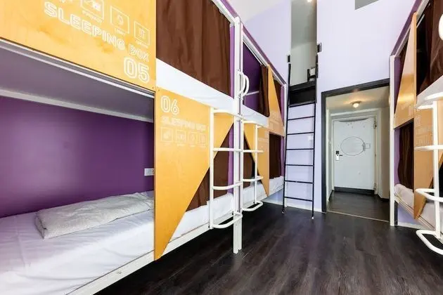 Bed in 8-Bed Dormitory Room with Private Bathroom