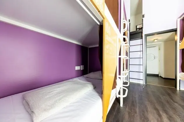 Bed in 8-Bed Dormitory Room with Private Bathroom