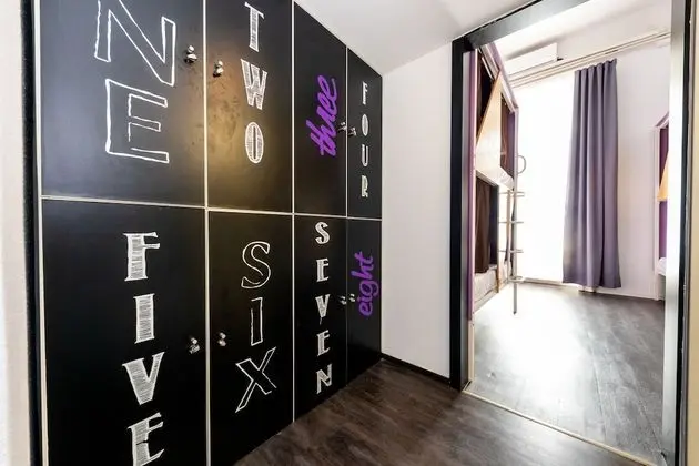 Bed in 8-Bed Dormitory Room with Private Bathroom