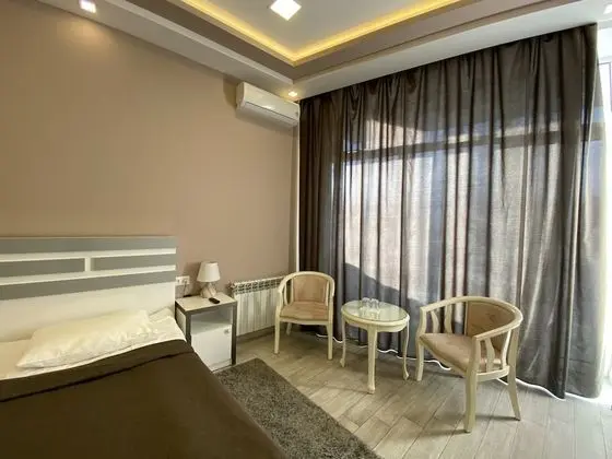 Deluxe Oda, 1 En Büyük (King) Boy Yatak