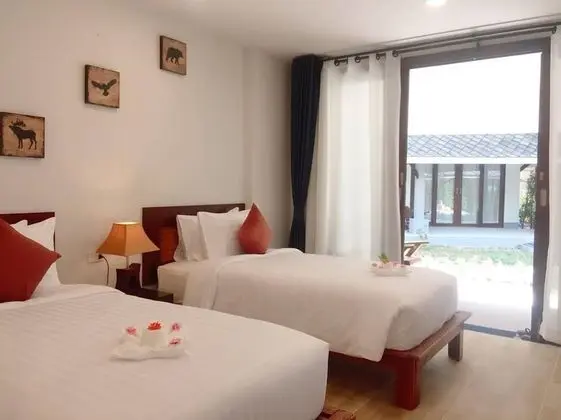 Deluxe Tek Büyük veya İki Ayrı Yataklı Oda