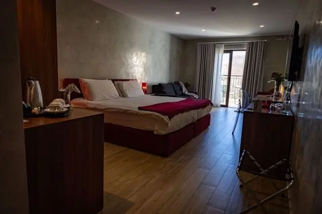 Deluxe Tek Büyük veya İki Ayrı Yataklı Oda
