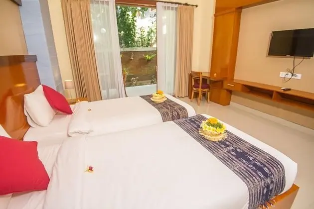 Deluxe Tek Büyük veya İki Ayrı Yataklı Oda