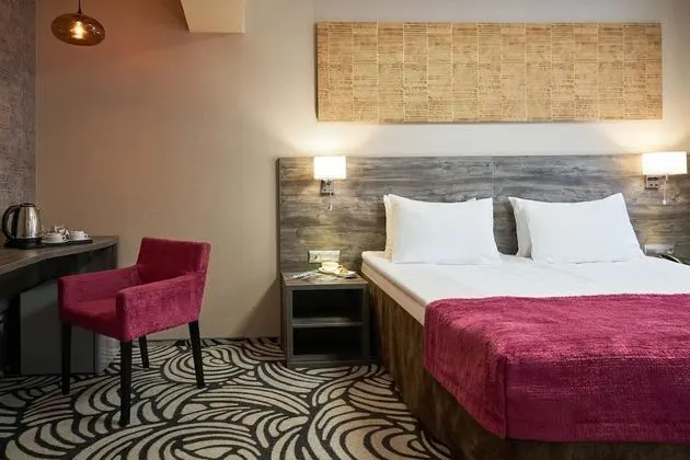 Deluxe Tek Büyük veya İki Ayrı Yataklı Oda