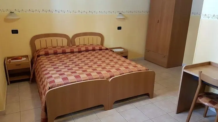 Tek Büyük veya İki Ayrı Yataklı Oda (with 1-2-3-4 pax)