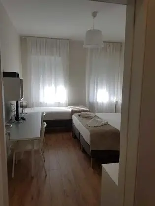 Üç Kişilik Oda