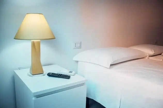 Deluxe Tek Büyük veya İki Ayrı Yataklı Oda (Palinuro)