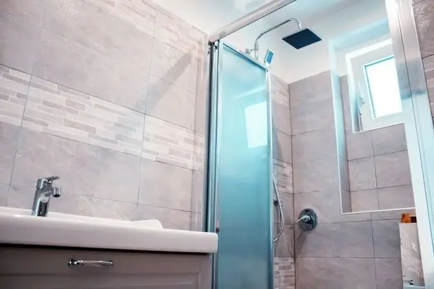 Deluxe Tek Büyük veya İki Ayrı Yataklı Oda (Palinuro)