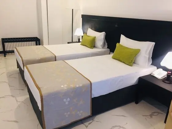 Deluxe Tek Büyük veya İki Ayrı Yataklı Oda