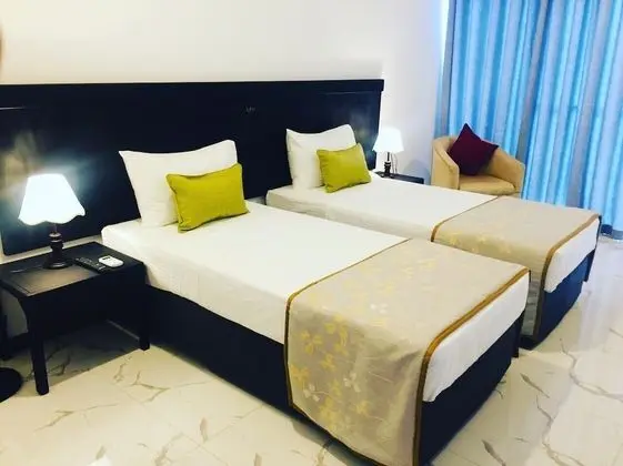 Deluxe Tek Büyük veya İki Ayrı Yataklı Oda