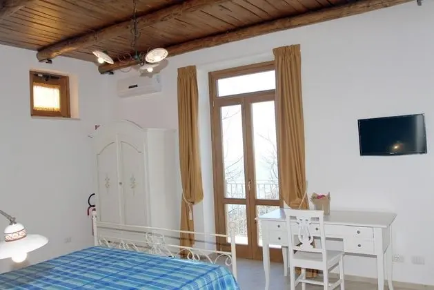 Deluxe Üç Kişilik Oda (Mare)