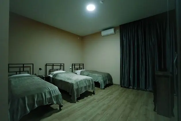 Standard Dört Kişilik Oda, 4 Yatak Odası, Bahçe Manzaralı (With extra bed)