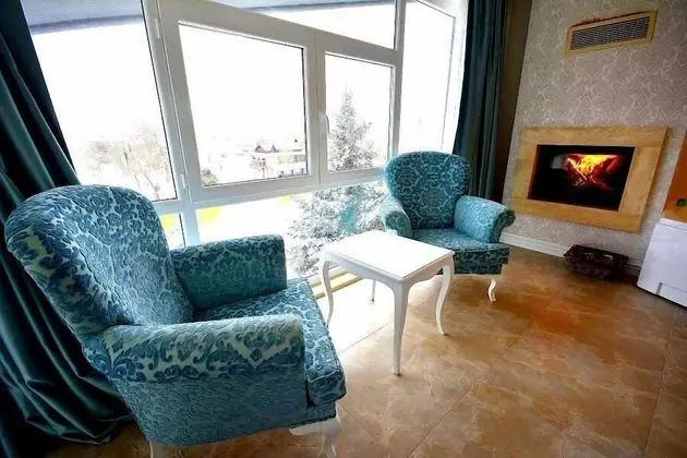 Deluxe Tek Büyük Yataklı Oda, Şömine, Nehir Manzaralı (Jakuzi)