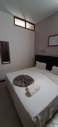 Basic Tek Büyük veya İki Ayrı Yataklı Oda