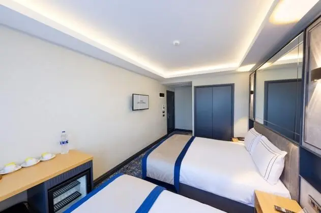 Deluxe Üç Kişilik Oda , Şehir Manzaralı