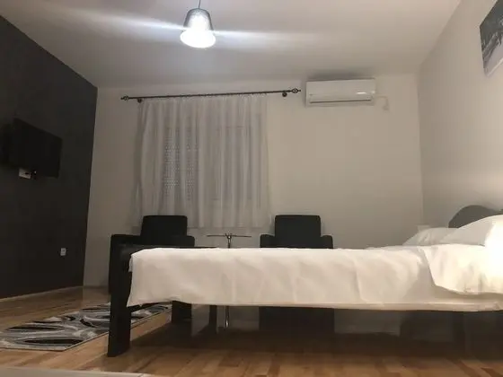 Deluxe Tek Büyük veya İki Ayrı Yataklı Oda