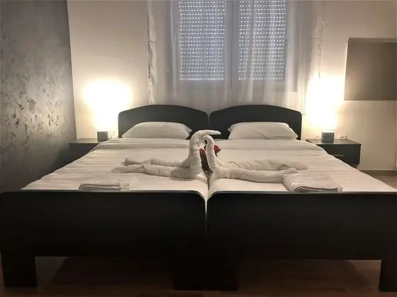 Deluxe Tek Büyük veya İki Ayrı Yataklı Oda