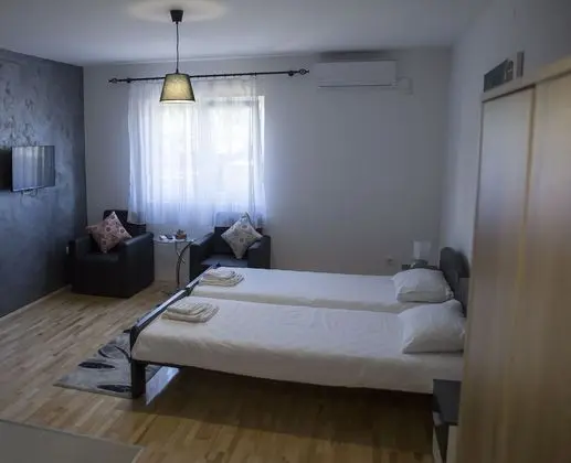 Deluxe Tek Büyük veya İki Ayrı Yataklı Oda