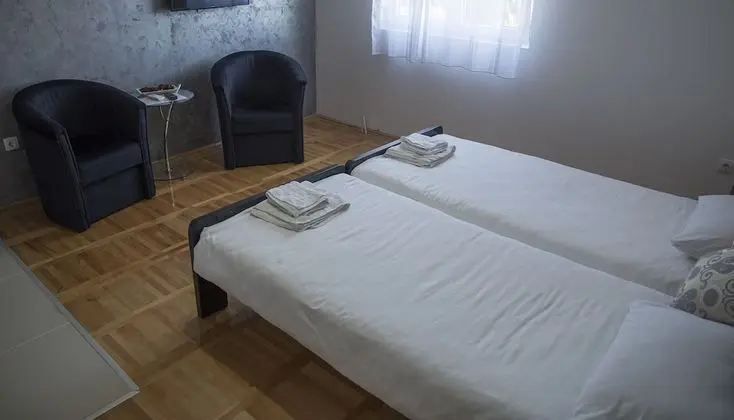 Deluxe Tek Büyük veya İki Ayrı Yataklı Oda