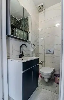 Üçlü