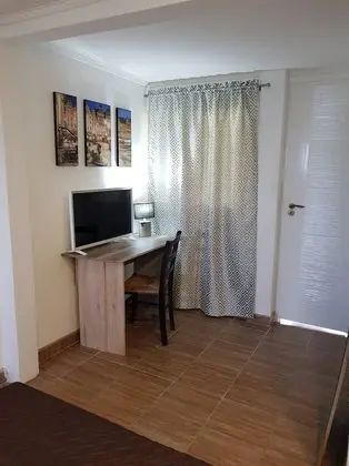 Deluxe Tek Büyük Yataklı Oda (Brown)