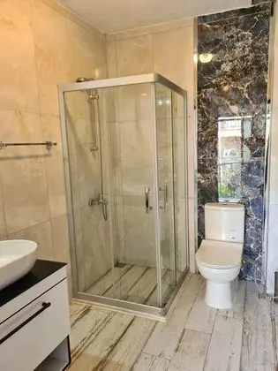 Standart Üç Kişilik Deniz Manzaralı Oda