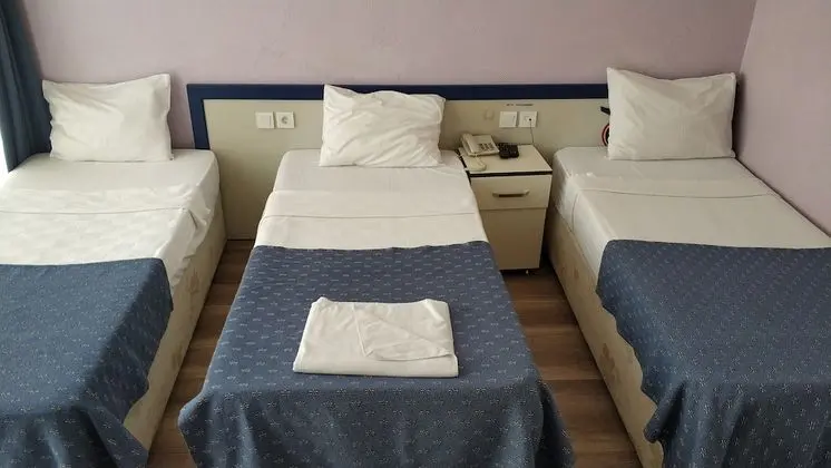 Üç Kişilik Oda