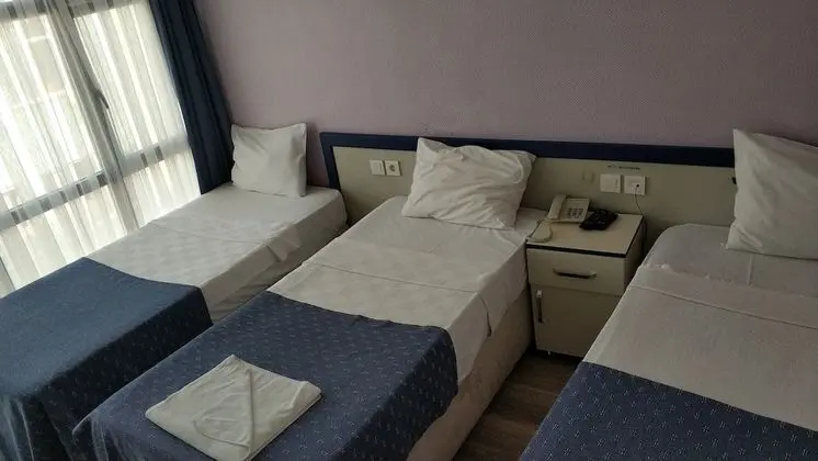 Üç Kişilik Oda